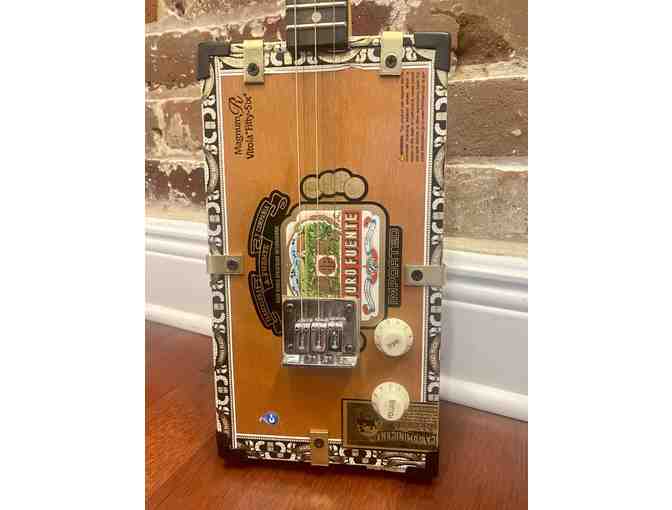 Yborâs own Arturo Fuente Cigar Box Guitar