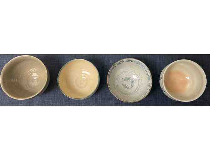 Four Hand Made and Painted Pottery Tea Bowls from Japan