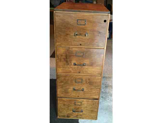 Four Drawer (legal size) wooden file cabinet.