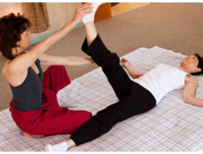 Four Yoga Classes at Eyes of the World Yoga and a Yoga Massage by Deb