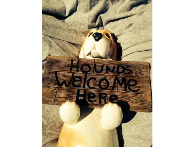 Basset Statue with 'Hounds Welcome Here' sign