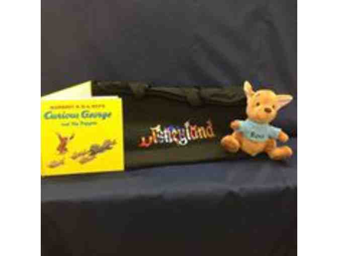 Disneyland canvas tote bag, Roo stuffed animal and Curious George book
