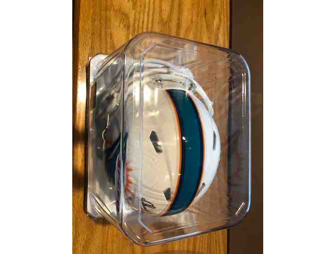 A Miami Dolphins Miniature Helmet Autographed by #90 Charles Harris!