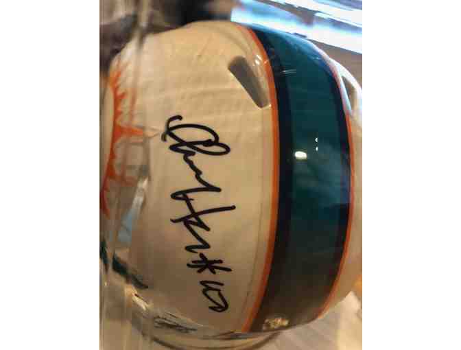 A Miami Dolphins Miniature Helmet Autographed by #90 Charles Harris!