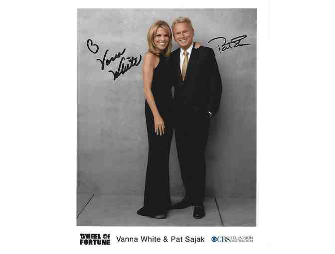 Wheel of Fortune - Four (4) Tickets, an Autographed Picture, a baseball cap, and Goodies