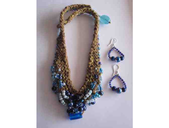Knitted necklace with glass beads, and matching earrings
