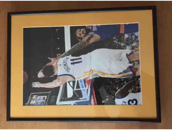 Danial Katz, Orinda: Three framed Golden State Warriors photos.*