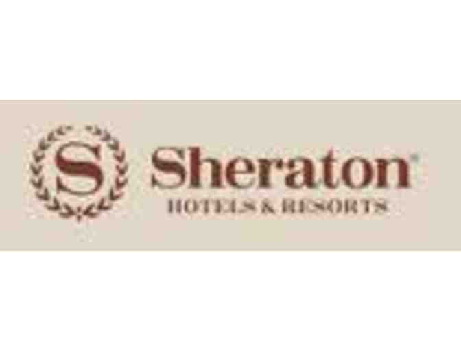 Enjoy a Three Night Stay - Club Access at the Sheraton New Orleans & 2  tix to WWII Museum