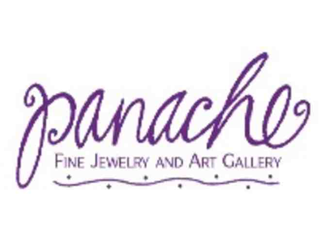 Yellow gold and blue topaz earrings ($895 value) from Panache Fine Jewelry and Art Gallery