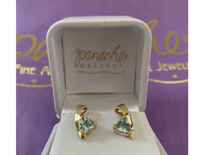Yellow gold and blue topaz earrings ($895 value) from Panache Fine Jewelry and Art Gallery