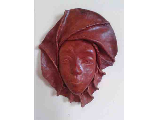 Pair of Sculpted Leather Masks from Haiti