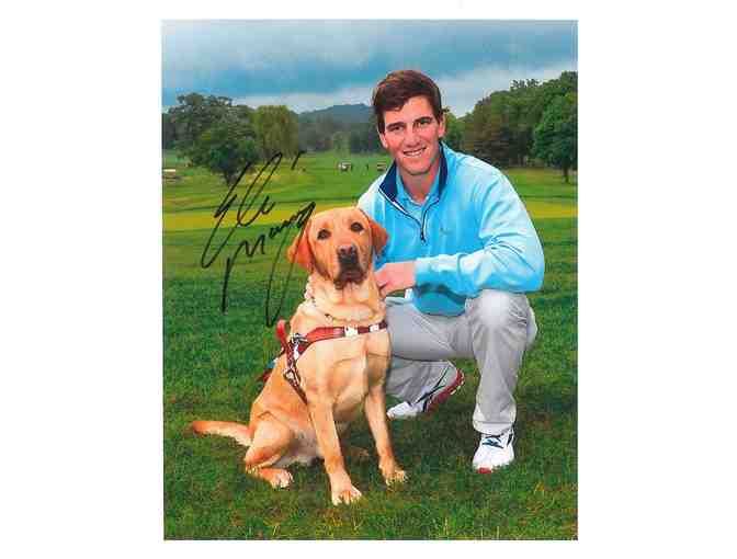 Autographed Eli Manning Photo with Guiding Eyes Dog - BUY NOW
