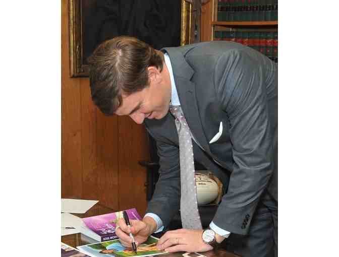 Autographed Eli Manning Photo with Guiding Eyes Dog - BUY NOW