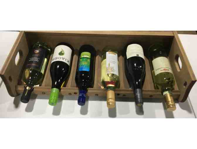 Wine rack stocked with 6 bottles of wine