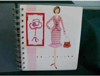 $30 gift card to Salon Sei Bella along with a 'Red Hat' theme basket