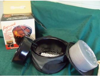 Coupon for an oil change at 'Lawless' accompanied by a sports theme gift basket