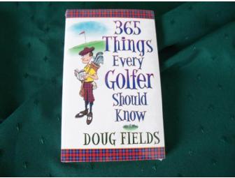 Coupon for an oil change at 'Lawless' accompanied by a sports theme gift basket