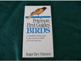 Coupon for an oil change at 'Lawless' accompanied by a sports theme gift basket