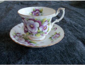 $25 Gift Card to the Woburn Florist accompanied by a pansy theme gift basket