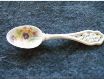 $25 Gift Card to the Woburn Florist accompanied by a pansy theme gift basket