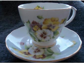 $25 Gift Card to the Woburn Florist accompanied by a pansy theme gift basket