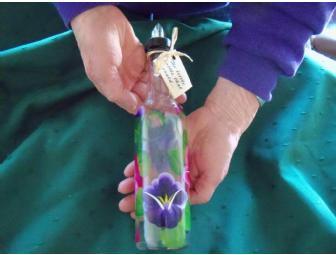 $25 Gift Card to the Woburn Florist accompanied by a pansy theme gift basket