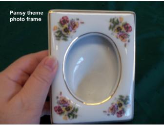 'In the Pink' theme basket features a capodimonte rose