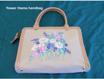 'In the Pink' theme basket features a capodimonte rose