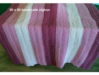 'In the Pink' theme basket features a capodimonte rose