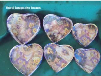 'In the Pink' theme basket features a capodimonte rose