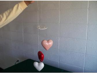 $30 Alessandro Salon Gift Card accompanied by a heart themed basket