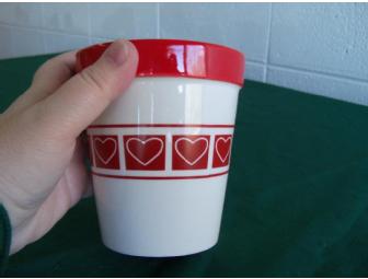 $30 Alessandro Salon Gift Card accompanied by a heart themed basket