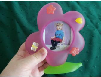 $50 gift certificate to Hillside Florist along with a garden basket