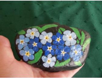 $50 gift certificate to Hillside Florist along with a garden basket