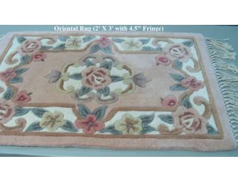 Oriental Rug Basket with assorted items
