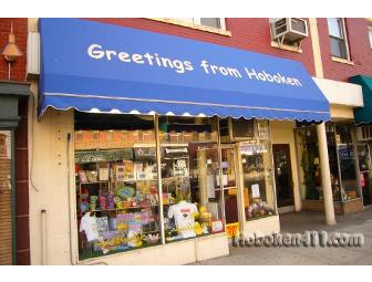 A basket of children's books and goodies from Greetings from Hoboken