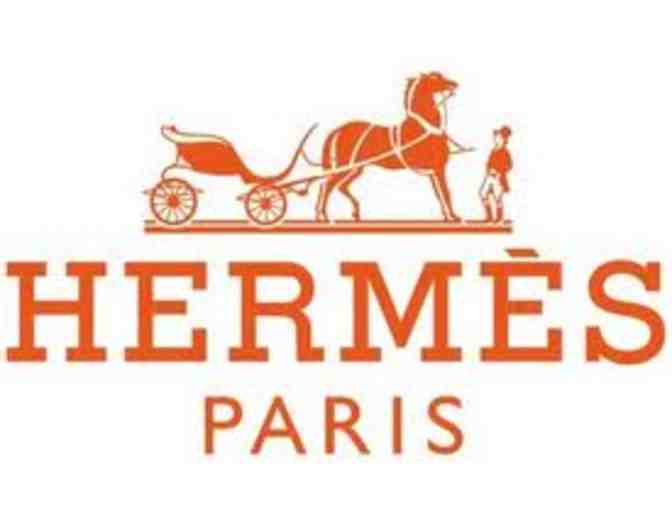 Hermes of Paris:  $500 gift certificate plus an orange silk equestrian-themed twilly
