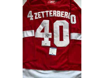 Autographed Hockey Jersey signed by Henrik Zetterberg