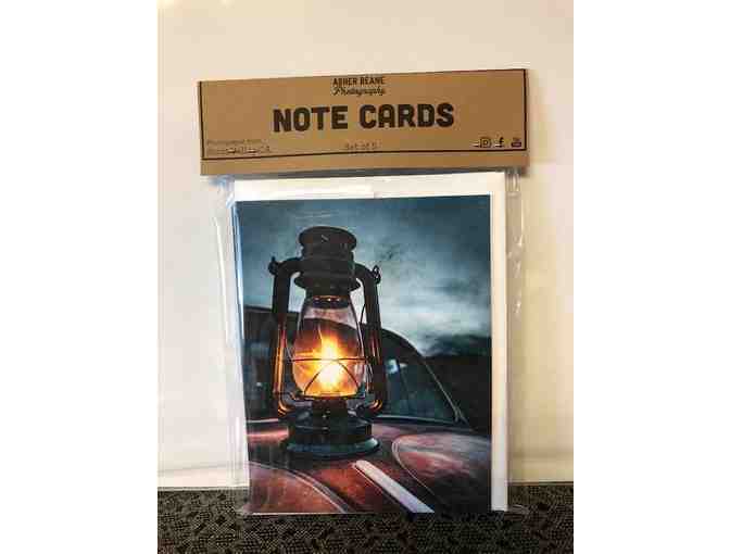 Two matted photographs and two note card packs