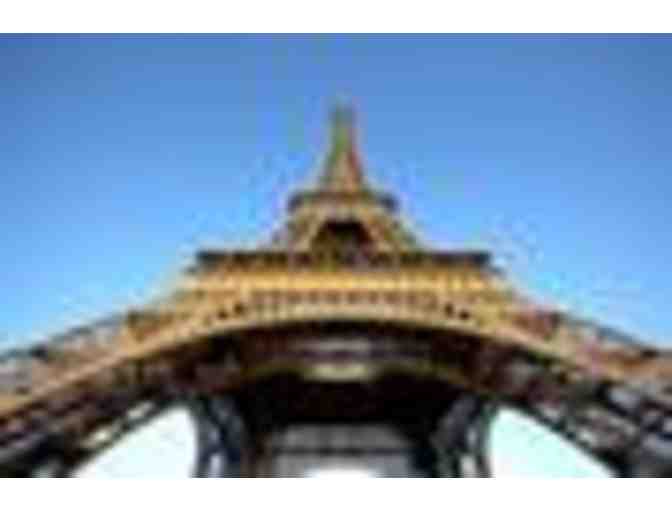 Fly to the City of Lights! Exceptional Stay, Tour and Dinner at the Eiffel Tower