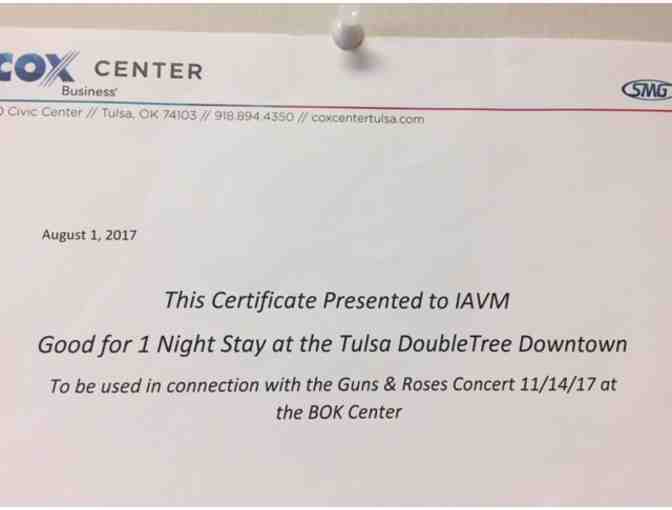 Two tickets and one-night hotel accommodations for the Guns N Roses, Not in This Lifetime