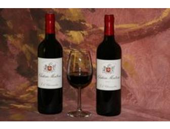 Four Bottles of Bordeaux Wine