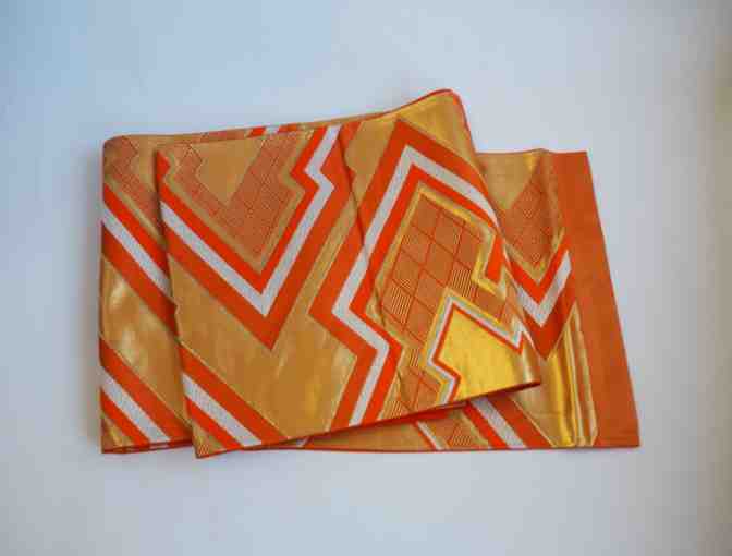 STAFF-CREATED/CURATED: Orange, Gold and Silver Designed Obi Table Runner