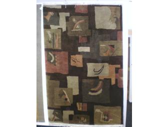 Hand woven wool area rug