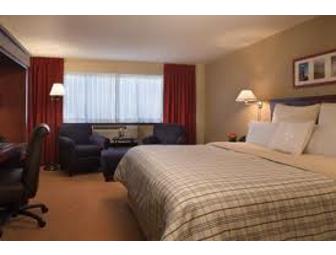 Two F1 Racing Gift Certificates and One Night Stay for Two at the Four Points by Sheraton