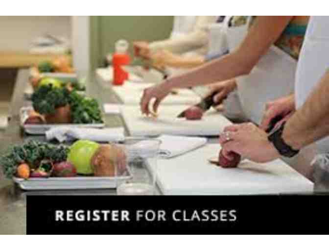 $100 dollar gift certificate for the restaurant or a class at The New School of Cooking
