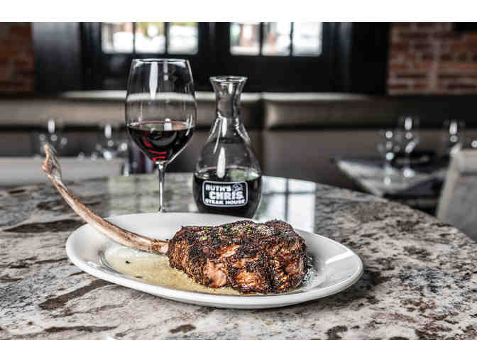Ruth's Chris Gift Bag: $100 gift card,bottle of wine, and, plush cow