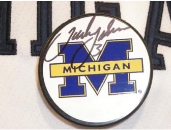 Jack Johnson autographed Michigan hockey puck