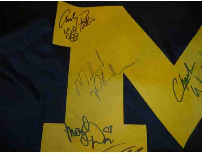 MIchael Phelps,  autographed Michigan Flag signed by nine UofM Olympians