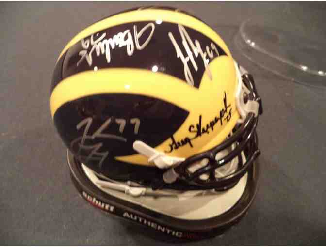 Jake Long, Jeff Backus, Jon Runyan. 7 O-Line greats auto Mini Football Helmet